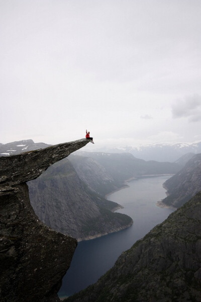 Trolltunga, Hardangerfjord region in Norway. 10 hours hard hike to get there - bring sturdy boots and be equipped for a hike in the high mountains. Photo by OpplevOdda, via Flickr