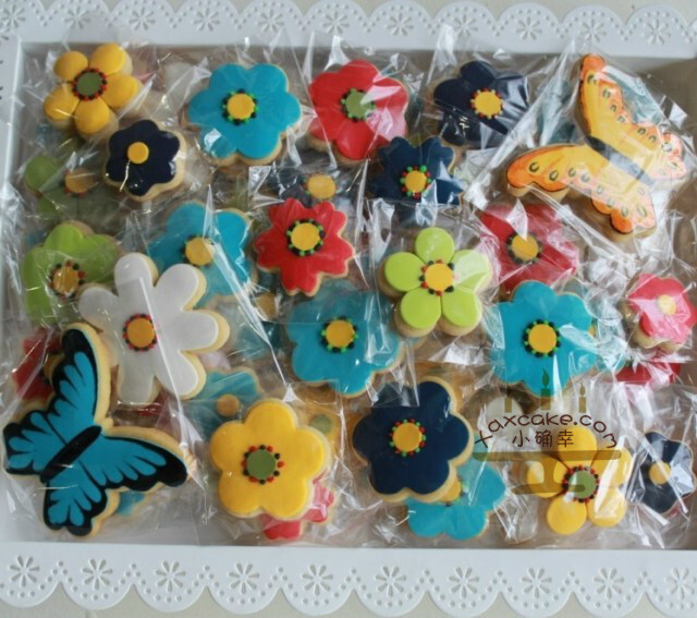 花朵、蝴蝶，美丽的饼干：）来自小确幸bake，西安小确幸创意蛋糕 官网：www.xqxcake.com淘宝网店：xqxcake.taobao.com