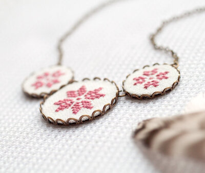 Tribal necklace with three dusty pink cross stitch ethnic flowers in bronze - gift for her