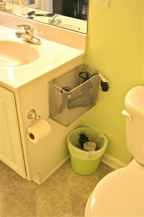 smart: a basket to keep your hairdryer/straightener/curler off the sink out of the way--girls' bathroom