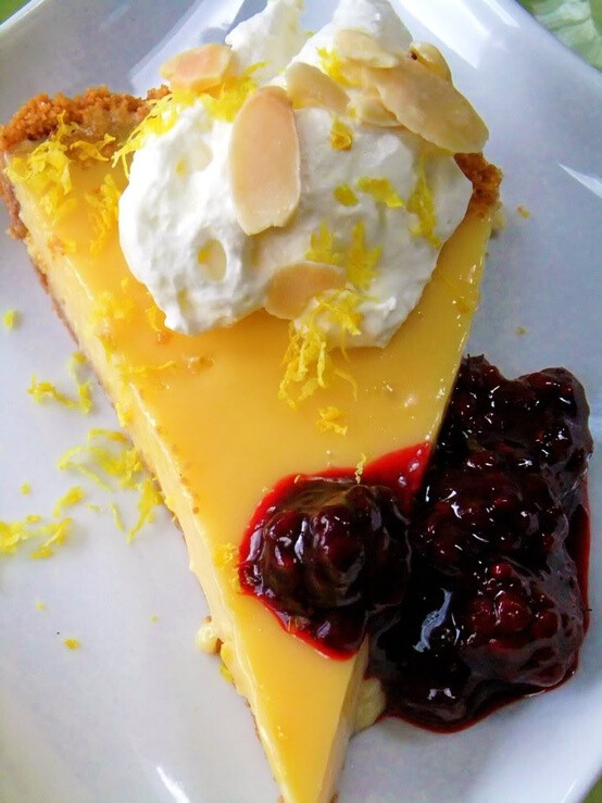 PROUD ITALIAN COOK: Limoncello Tart with Amaretti Cookie Crust and Blueberry Blackberry Sauce