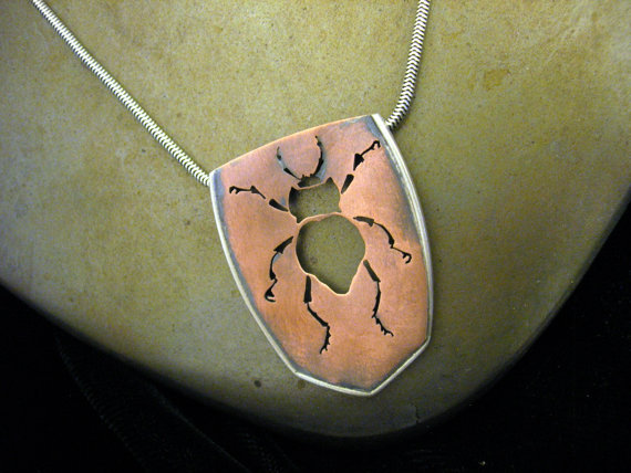 Akis beetle necklace in copper and silver