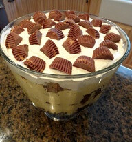 "Heaven in a Bowl" vanilla pudding, whipped cream, brownie mix, reese's cups....OhMyGosh.