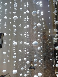 Thread cotton balls to make fake snow. &gt;&gt; SO cute for windows or for show displays!