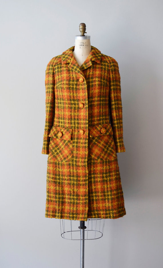 vintage 1960s Davidow boucle wool coat in olive green & orange plaid. large wool covered buttons, big patch pockets, slender sleeves, bust darts, back strap & buttons detail and full lining