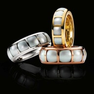 Faceted square pearls and gold rings by Louis Golay