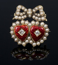 Late Victorian gold and red guilloche enamel double heart brooch, with two red guilloche enamel hearts each set with an old cut diamond, surrounded by a border of seed pearls with a seed pearl ribbon …