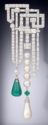 An art deco natural pearl emerald and diamond brooch by Van Cleef & Arpels, circa 1926. Via The Jewellery Editor.