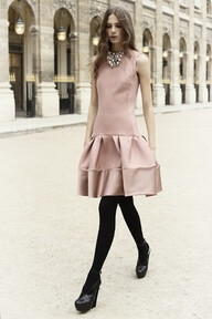 Pre Fall 2012 Muted pink tiered dress. Grey pearl necklace