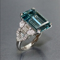 Art Deco Vintage 12.16 carat emerald cut aquamarine ring with baguette, bullet shaped and round diamonds set in platinum by Raymond Yard. @designerwallace