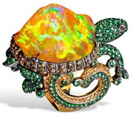 Lydia Courteille. Turtle ring with orange Mexican opal, orange sapphires, green garnets, yellow gold. Picture c/o The Jewellery Editor.