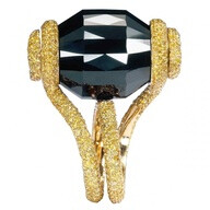 Ring by de Grisogono with a revolving 83.39 carat black diamond