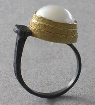 contemporary ring made from a nail, two tone metal & a pearl