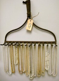 antique rake for jewelry! Awesome idea!