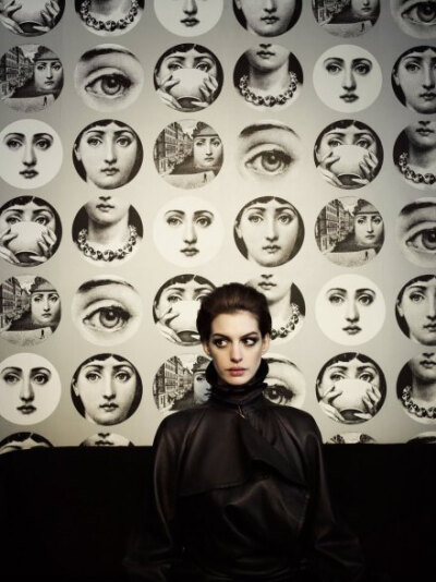 Anne Hathaway with prints by italian artist Fornasetti