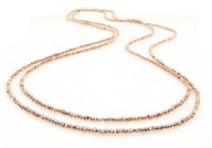 This stunning necklace features gorgeous rose gold pyrite. Rose gold. Length: 60 inches.