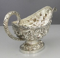 A Serling Silver Gravy Boat With Chrysanthemums & Roses