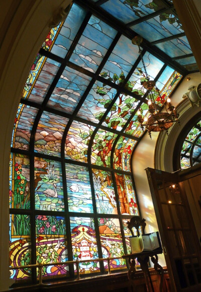 Stained glass hallway inside Parliament building.