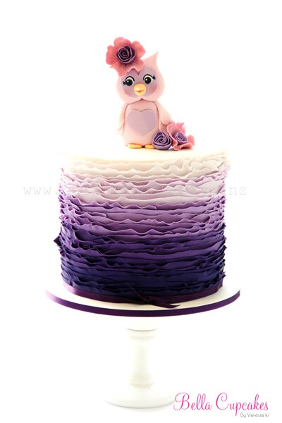 ombre ruffle cake with cute owl topper