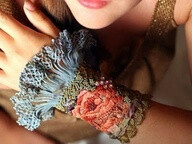 Antique textiles with hand embroidered cuff.