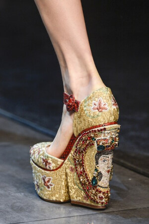 Dolce & Gabbana The Dolce & Gabbana collection exuded Italian heritage by way of mosaics and murals all encrusted with gems and jewels in the richest of colours. The shoes didn't escape the regal treatment. Photo By Go Runway