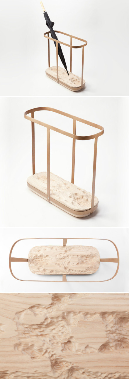 地景伞架，托盘模拟自然地貌形态，纽约 cmmnwlth 工作室作品。via： topographic umbrella stand by cmmnwlth http://t.cn/zYrDxuP