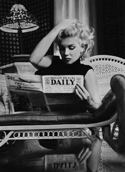 Marilyn Monroe Reading Motion Picture Daily, New York, 1955