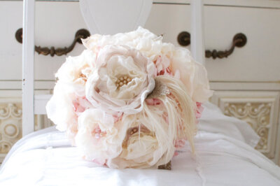 Shabby cottage bouquet of southern pink paper flowers, creamy fabric flowers, burlap, lace, pearls and feathers