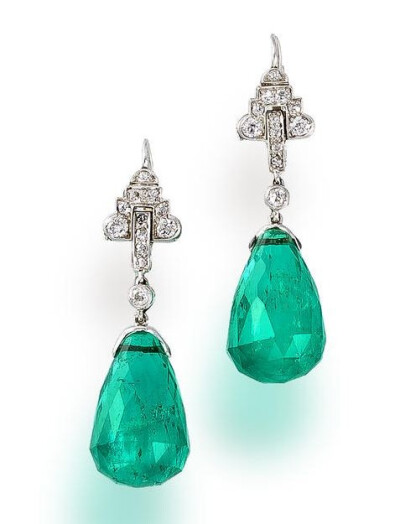 A pair of emerald and diamond pendant earrings