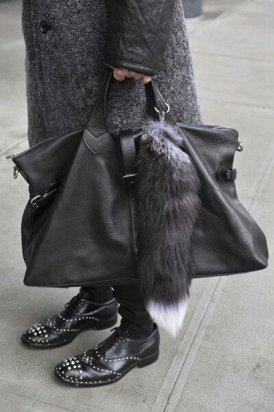 Kyle Anderson -Mulberry bag fox tail and Prada shoes.