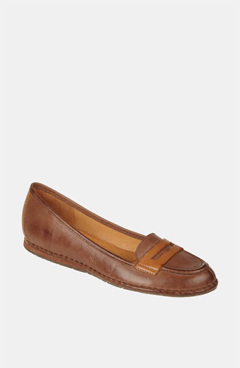 A slight, hidden wedge elevates a smooth leather loafer with modern appeal. Leather upper and lining/rubber sole. By Naya; imported.