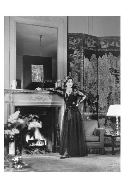 "'Where should one use perfume?' a young woman asked. 'Wherever one wants to be kissed,' I said." Gabrielle Chanel in her suite at the Ritz hotel in Paris. Published in Harper's Bazaar in 1937, this photo was chosen for the Chanel No.5 advertisement. For the first time, Chanel herself promoted her