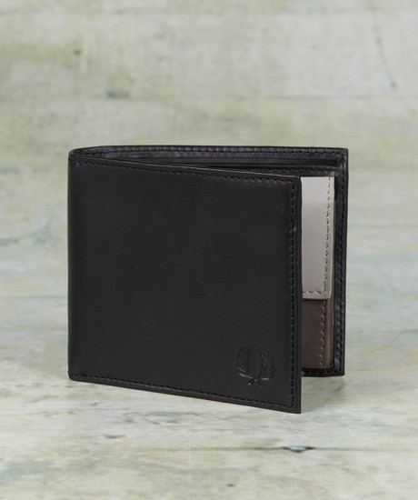 Leather Billfold &amp; Coin Wallet £60.00 Classic billfold wallet crafted in genuine leather with a smooth matt finish; complemented by multiple card slots, a slip pocket for notes and a convenient coin pocket. The inside of the wallet is offset by colour blocking in three different shades of leathe