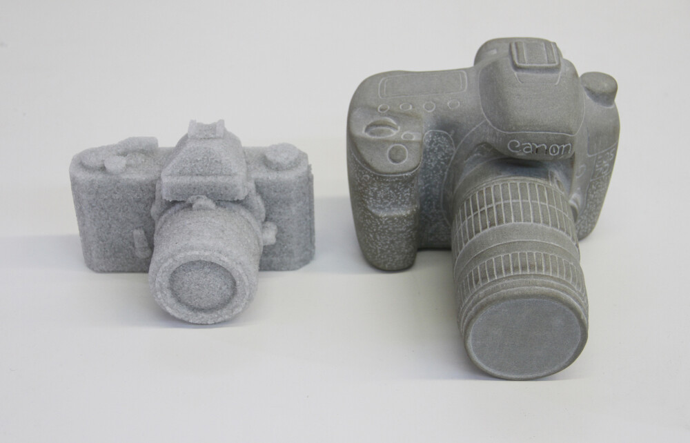 Grey Glass Camera, 2012, broken glass, resin and Angkorian Stone Camera, 2012, carved stone