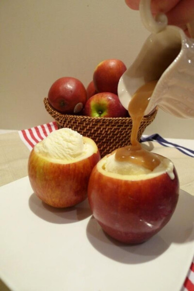 Hollow out apples and bake with cinnamon and sugar inside. After it's done baking, fill with ice cream and caramel.