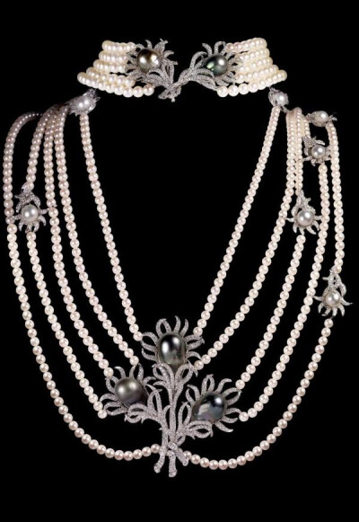 Mirari pearl and diamond ensemble with two necklaces which convert into a unique shoulder draping ornament.