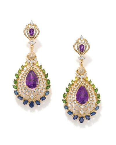 Earrings from the Ganjam’s Exotica collection, with coloured gemstones in shades on blues to greens and pear shaped amethysts as centerpieces.