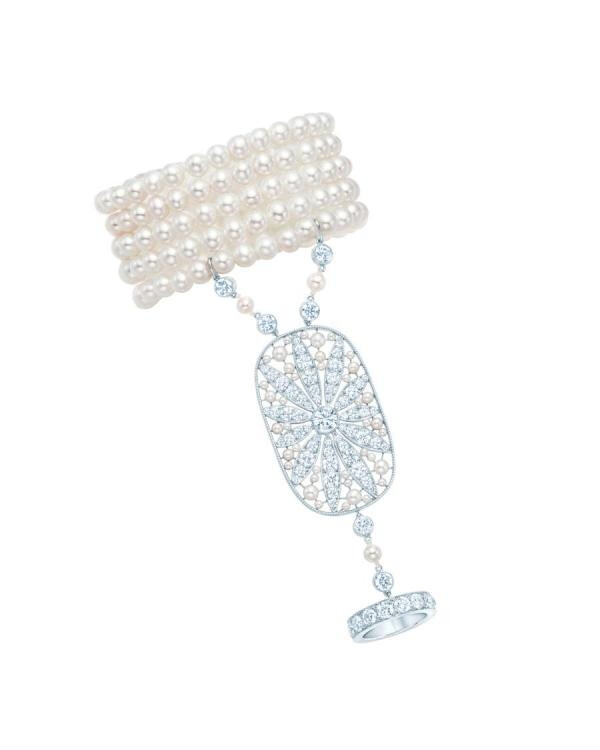 Hand ornament with a daisy motif in diamonds, cultured pearls and platinum. From The Great Gatsby collection by Tiffany &amp; Co., inspired by Baz Luhrmann’s film in collaboration with Catherine Martin.