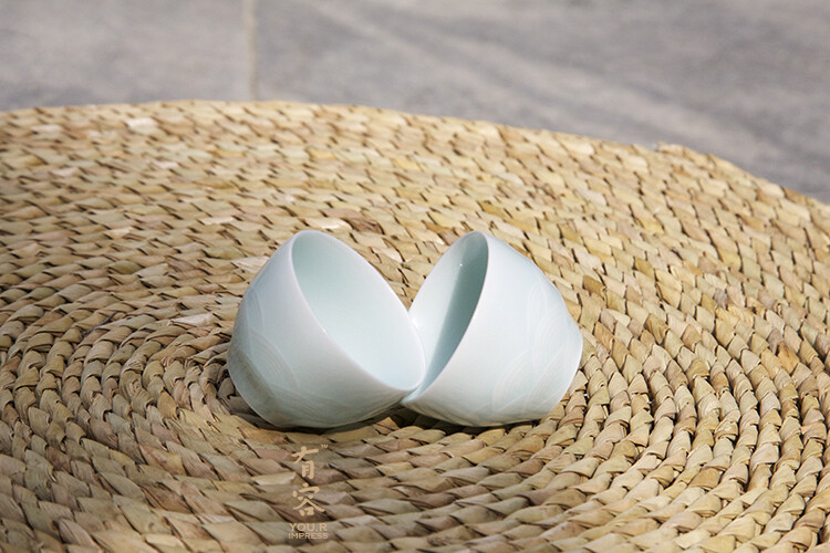 海水纹蛋壳杯。影青瓷胎质细腻，薄如纸。