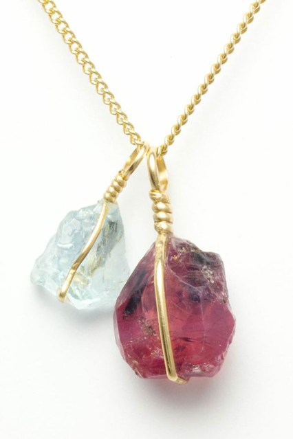 Venusrox Aquamarine and ruby pendent Aquamarine: "For women it lends courage and clarity to express one's inner knowledge and enhances intuitive abilities." Ruby: "A stone of prosperity, it brings passion, optimism and enthusiasm to its keeper."