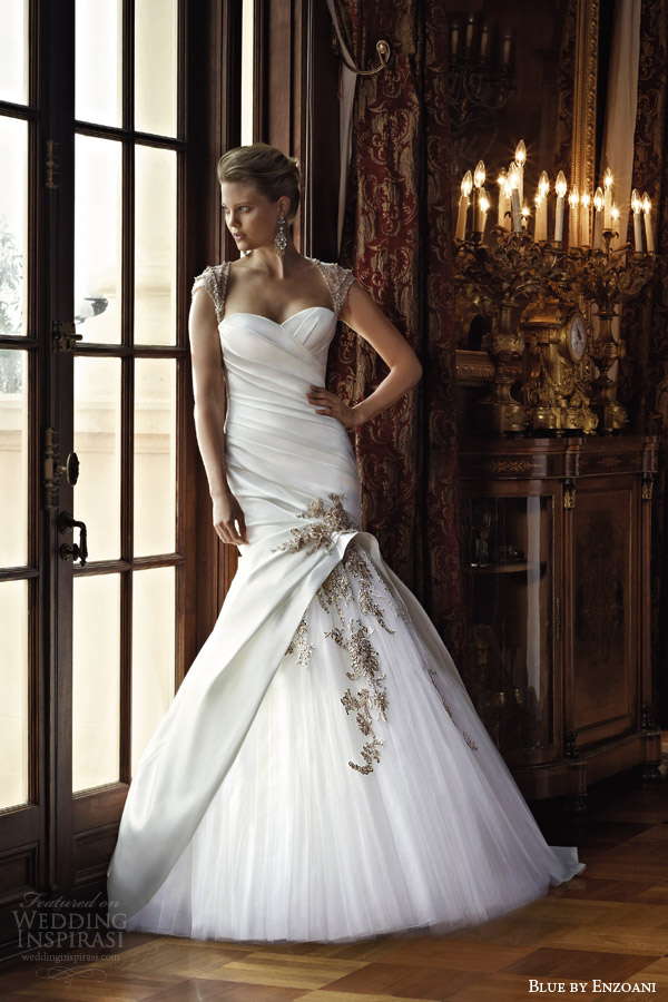 Blue by Enzoani 2014 Bridal Collection 本季着重于现代和传统的欧洲设计与高度关注细节相结合，光线和精致的蕾丝图案展现出精致的韵味，集经典与永恒为一身。