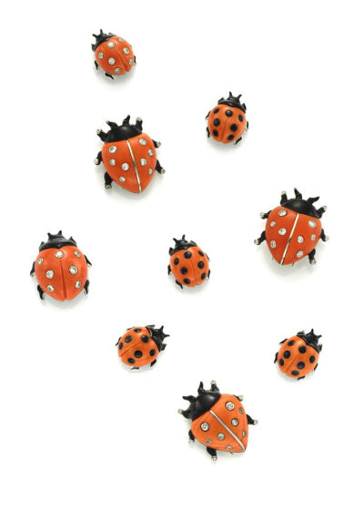 A Set of Carved Coral, Enamel and Diamond Ladybug Brooches, by Cartier.