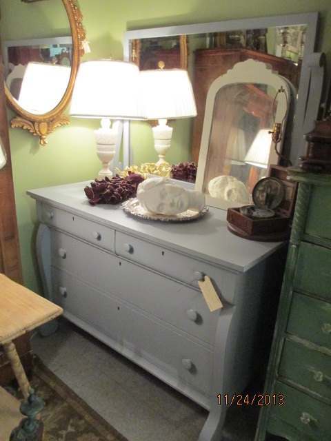 1840,s painted mahogany empire chest of drawers with mirror .Lots of storage. We ship world wide and all listed items are ready to ship today and then it is when the shipper picks up the item. Please contact us for a shipping quote. Thanks