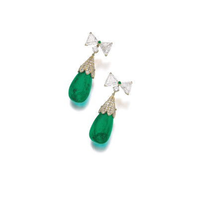 A pair of emerald and diamond earclips suspending a drop-shaped