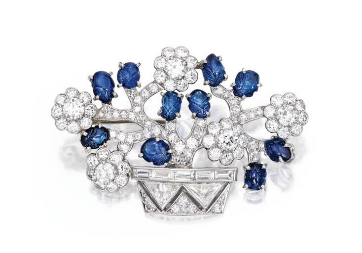 Property from the Estate of Katharine Hepburn – Platinum, Diamond and Sapphire Jardinière Brooch, Trabert &amp;amp; Hoeffer-Mauboussin – Designed as a charming flowering plant set with two triangle-cut diamonds weighing approximately 1.00 carat