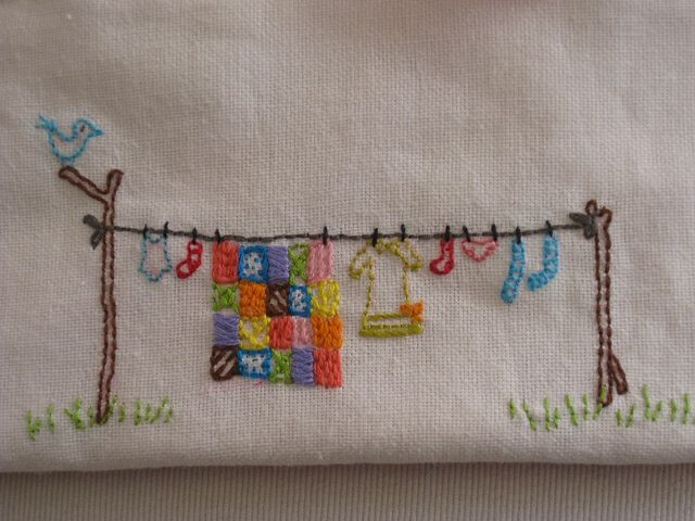 I stitched a similar scene with quilts on a line .. cross stitched on little finger towel for my grandmother. Bless her soul...she loved it!