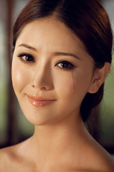 笑，是我掩饰难过的最卑劣的方法