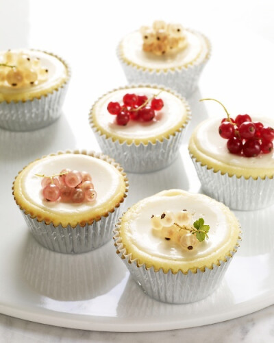 Cheesecake Cupcakes with Sour Cream Topping