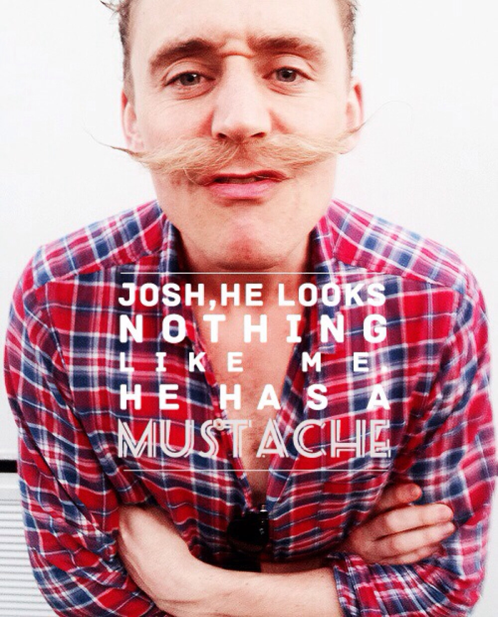 Josh, he looks nothing like me, he has a mustache! 