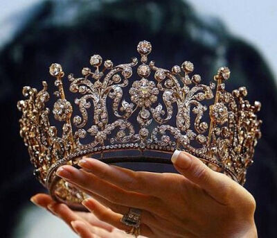 “She will place on your head an ornament of grace; A crown of glory she will deliver to you”